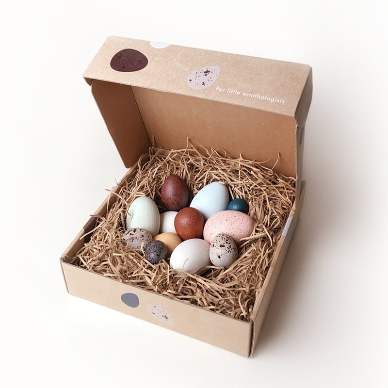 A Dozen Wooden Bird Eggs in a Box