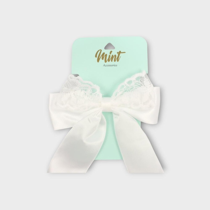 White Hair Band With A White Bow